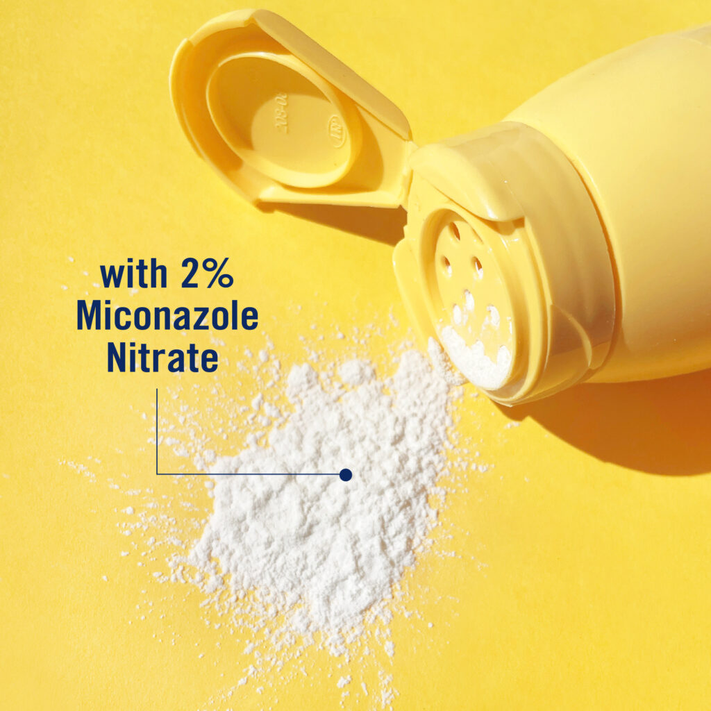 A close-up image of Desenex Athlete's Foot Powder, highlighting that it contains 2% Miconazole Nitrate.
